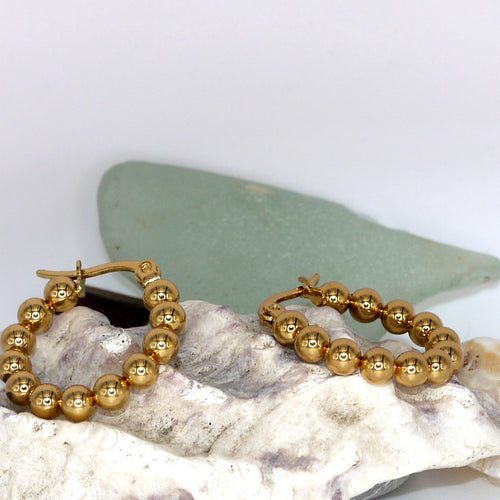 Beaded Hoop Earrings – flat lay