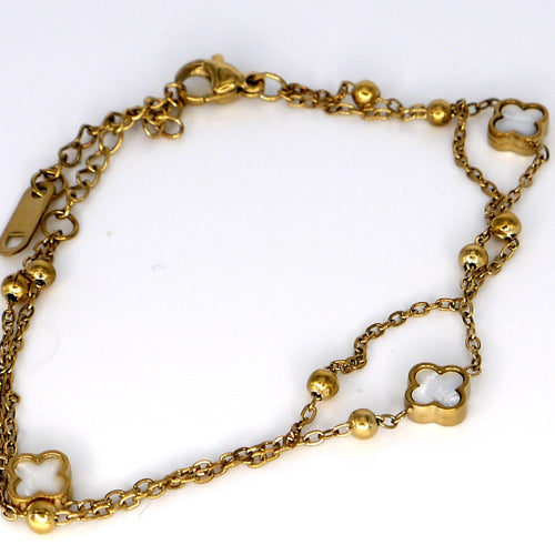 Clover Charm Bracelet – flat lay