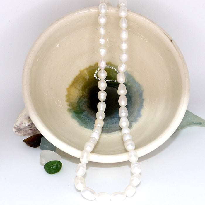 Freshwater Pearl Necklace – flat lay